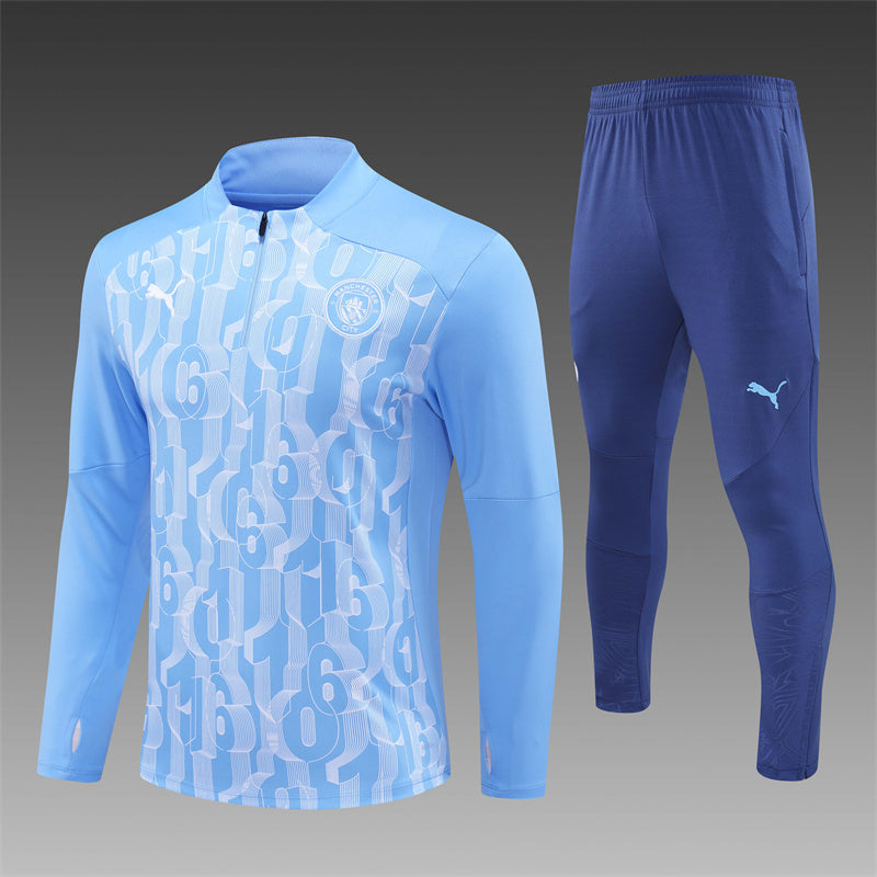 Manchester City with the 2024/2025 Blue Tracksuit