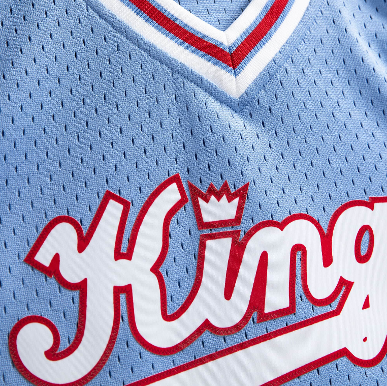 Men’s Reggie Theus Sacramento Kings 1985-86 Powder Blue Swingman Jersey By Mitchell &amp; Ness